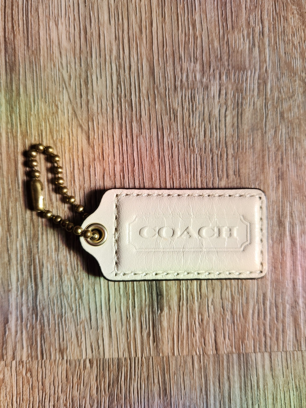Coach Cream Leather Bag Tag with Gold Ball Chain Accent